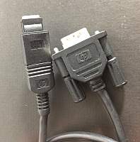 HP serial cable and adapter ends showing HP logo.JPG